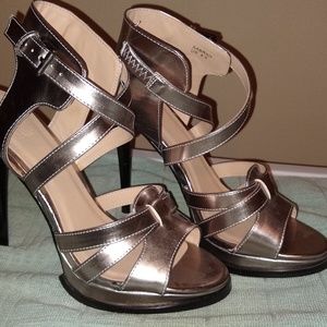 Women's size 8.5 heels/sandals. Color is gun metal